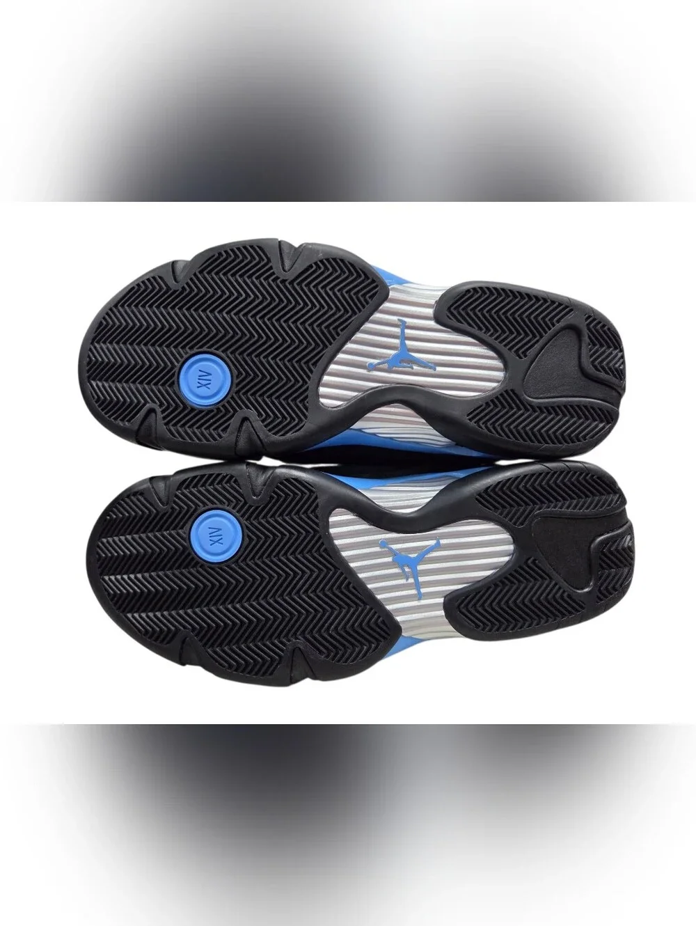 Air Jordan 14 Retro Black and University Blue Sneakers